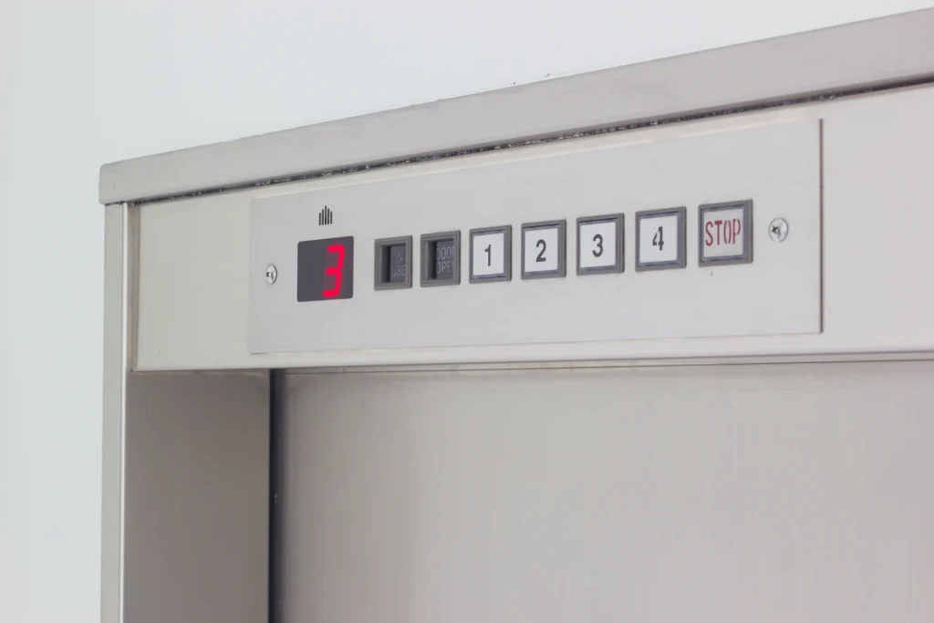 Dumbwaiter lift control panel with floor selection buttons