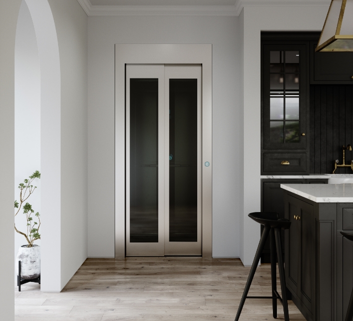 Home lift by Eltec with glass panels and stainless steel accent
