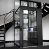 Platform lift installed alongside staircase for accessibility